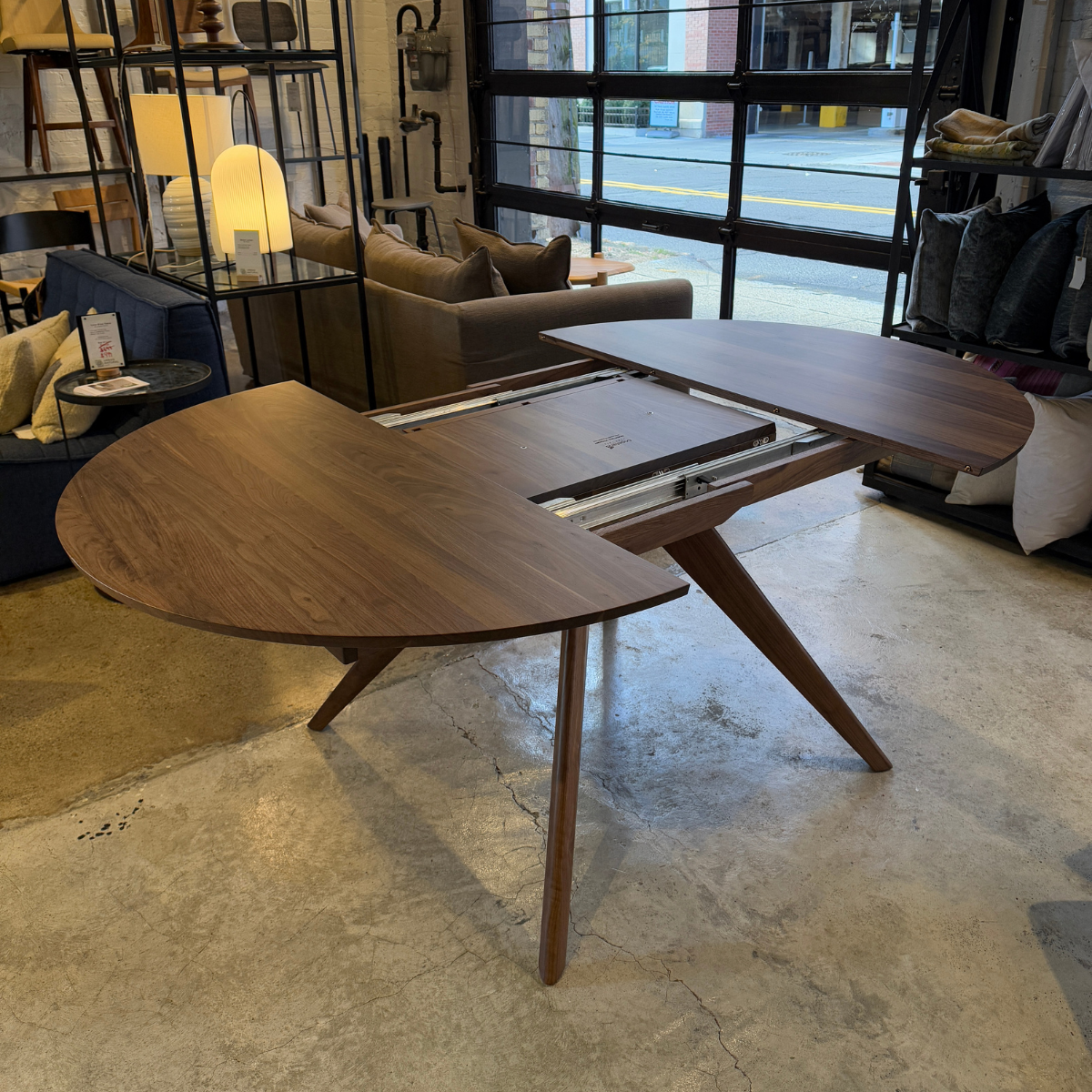 Catalina 48" Round Extension Dining Table in Natural Walnut by Copeland